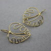 Monstera blad oorhangers in 14 ct goud