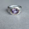 Chunky zilveren ring met paarse amethist in gouden zetting