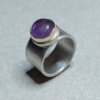 Zilveren ring met amethist in gouden zetting