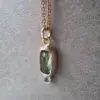 Gouden hanger met groene- en witte toermalijn