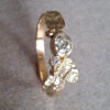 Gouden ring met blaadjes en een Oud Europees geslepen diamant