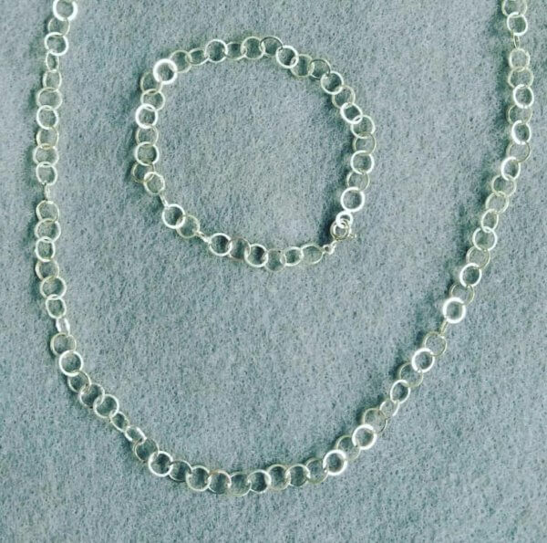 zilveren armband en collier met ronde schakel bijpassend set