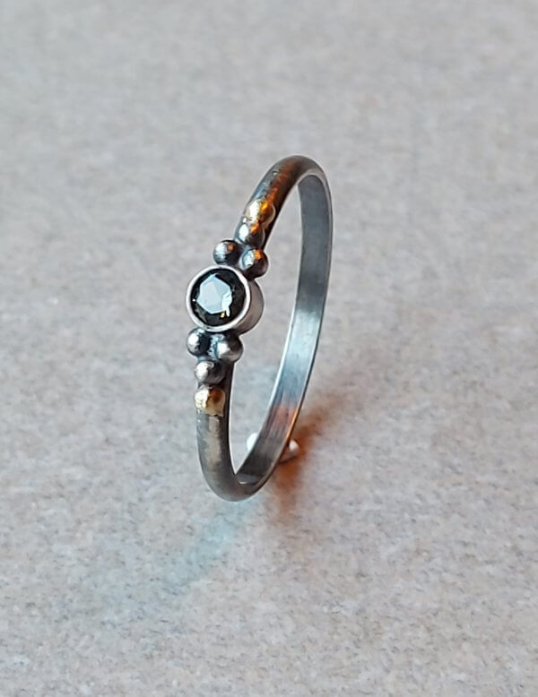 ring zilver met goud en groene toermalijn